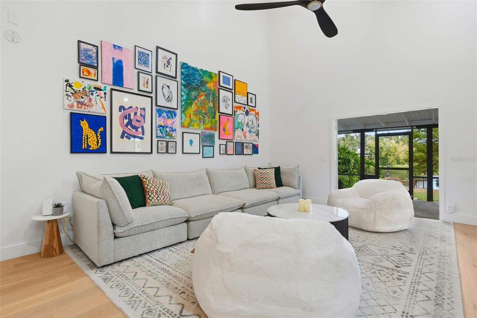 warm family sitting area that overlooks the dock and lake - 6349 RAVENWOOD WAY, SARASOTA