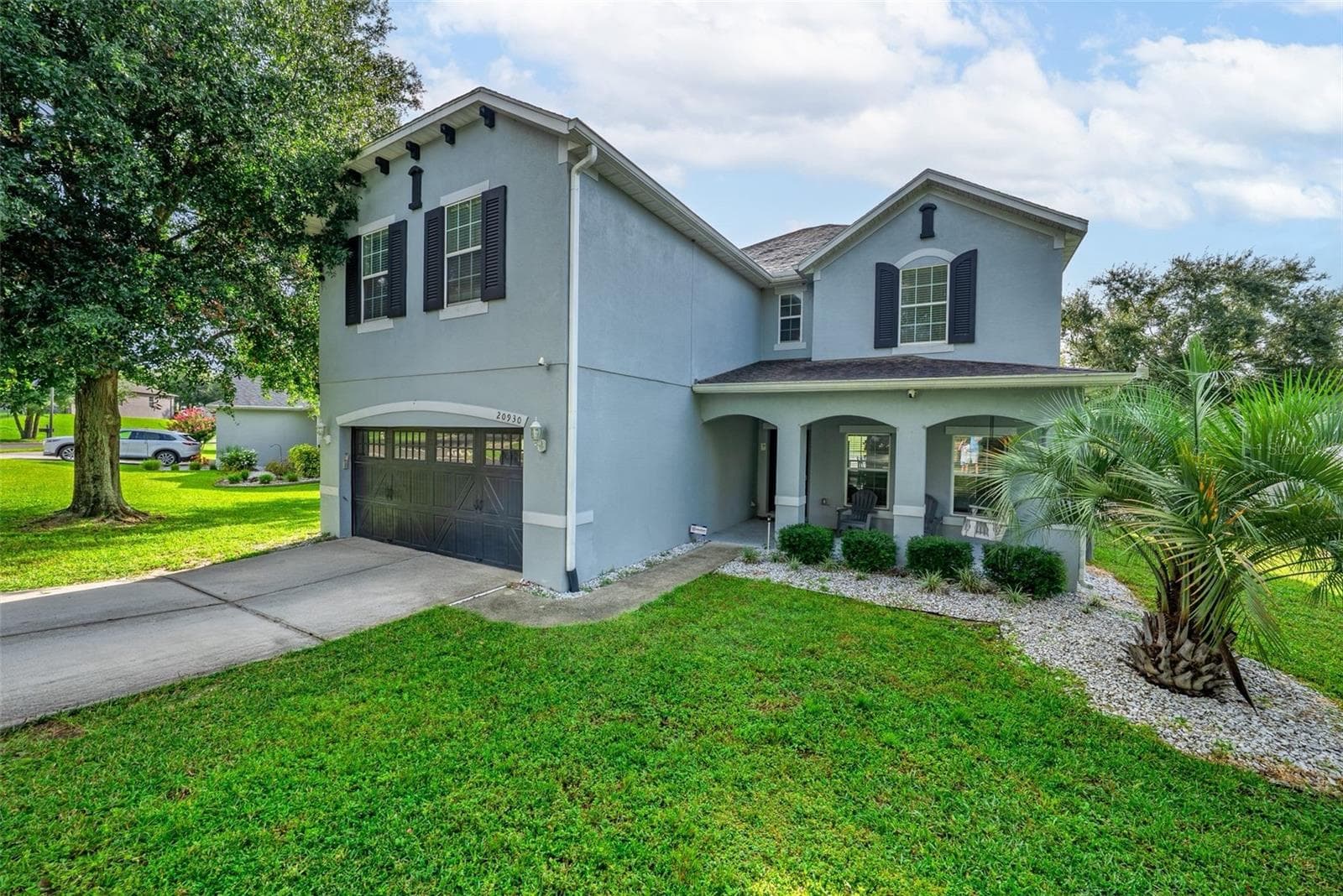 Enjoy sitting on the front porch sipping your morning coffee - 20930 SULLIVAN RANCH BLVD, MOUNT DORA