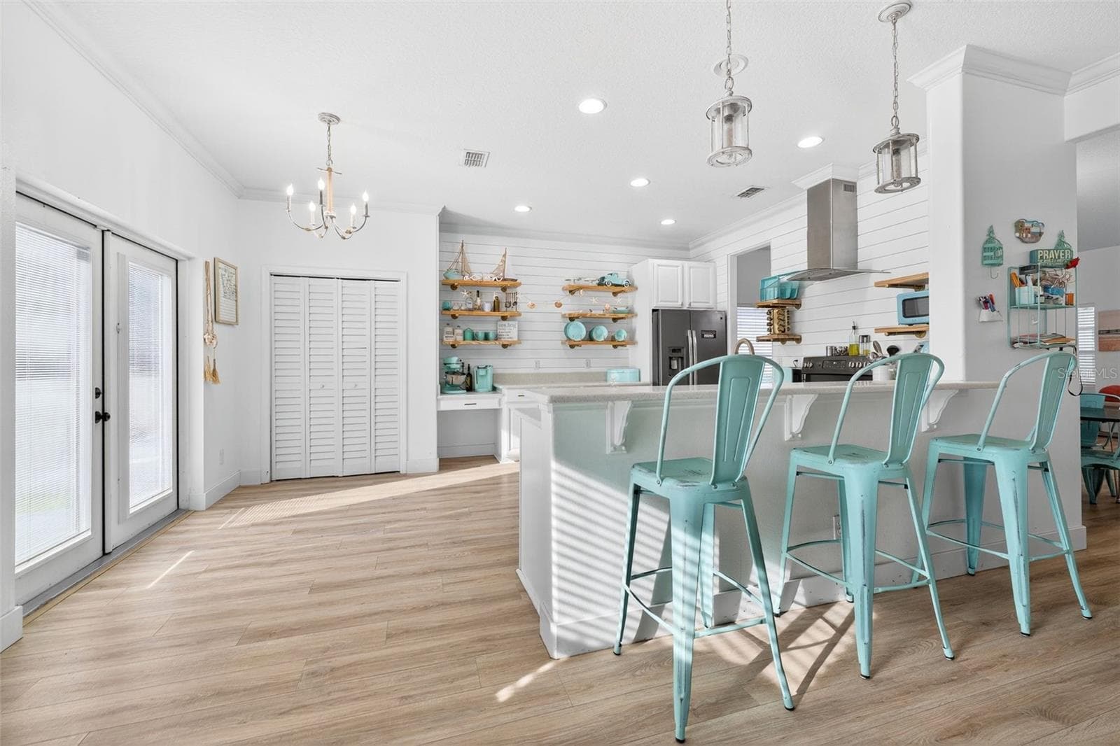 The oversized French doors lights up the kitchen and breakfast bar - 20930 SULLIVAN RANCH BLVD, MOUNT DORA