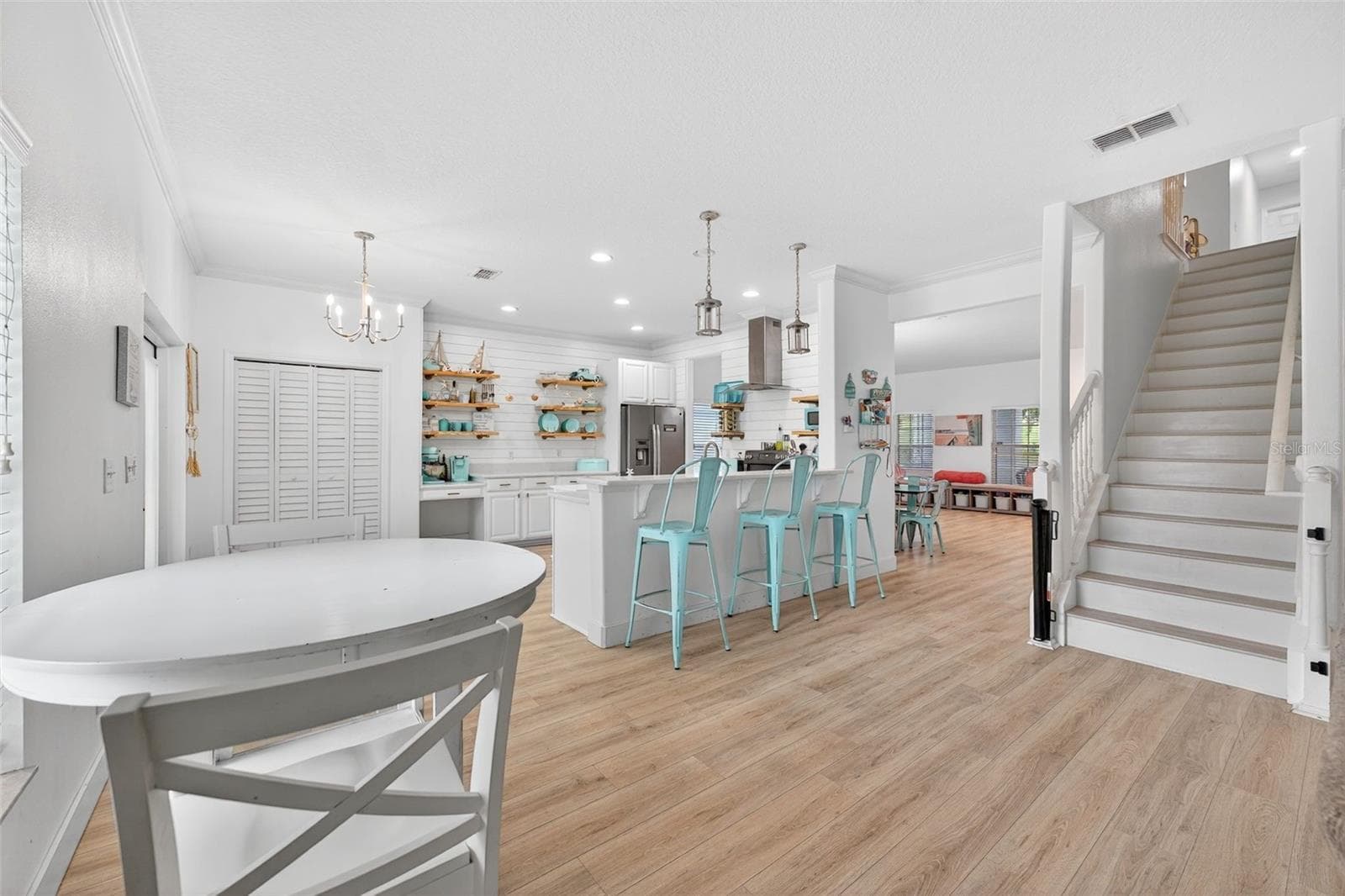Dinette area and no carpet stairs leading to the huge 2nd floor - 20930 SULLIVAN RANCH BLVD, MOUNT DORA