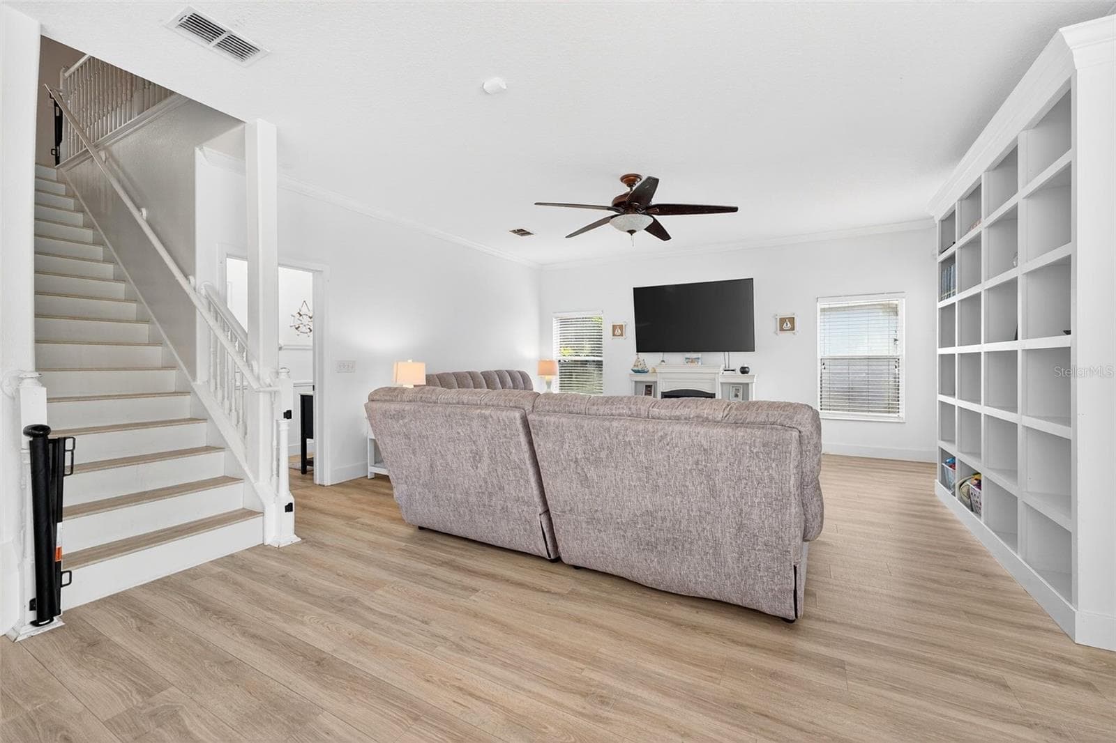 View of the family room from the kitchen - 20930 SULLIVAN RANCH BLVD, MOUNT DORA
