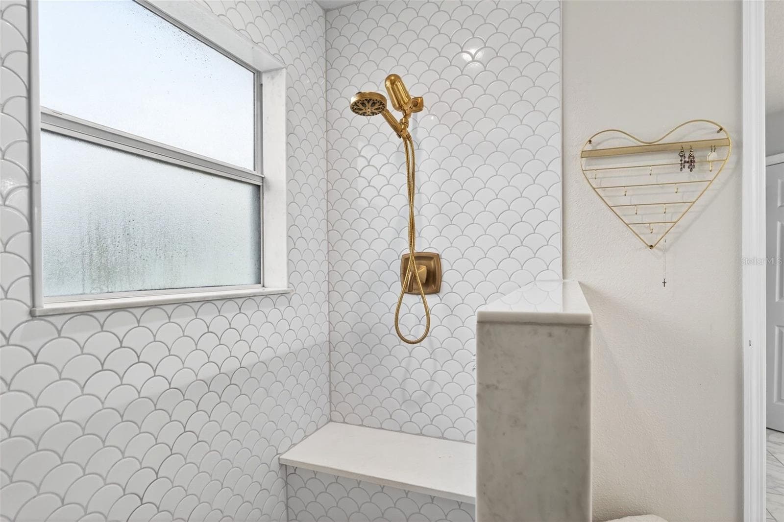 Beautiful wall tile, shower faucets with easy hand held capability but a spacious sized bench - 20930 SULLIVAN RANCH BLVD, MOUNT DORA