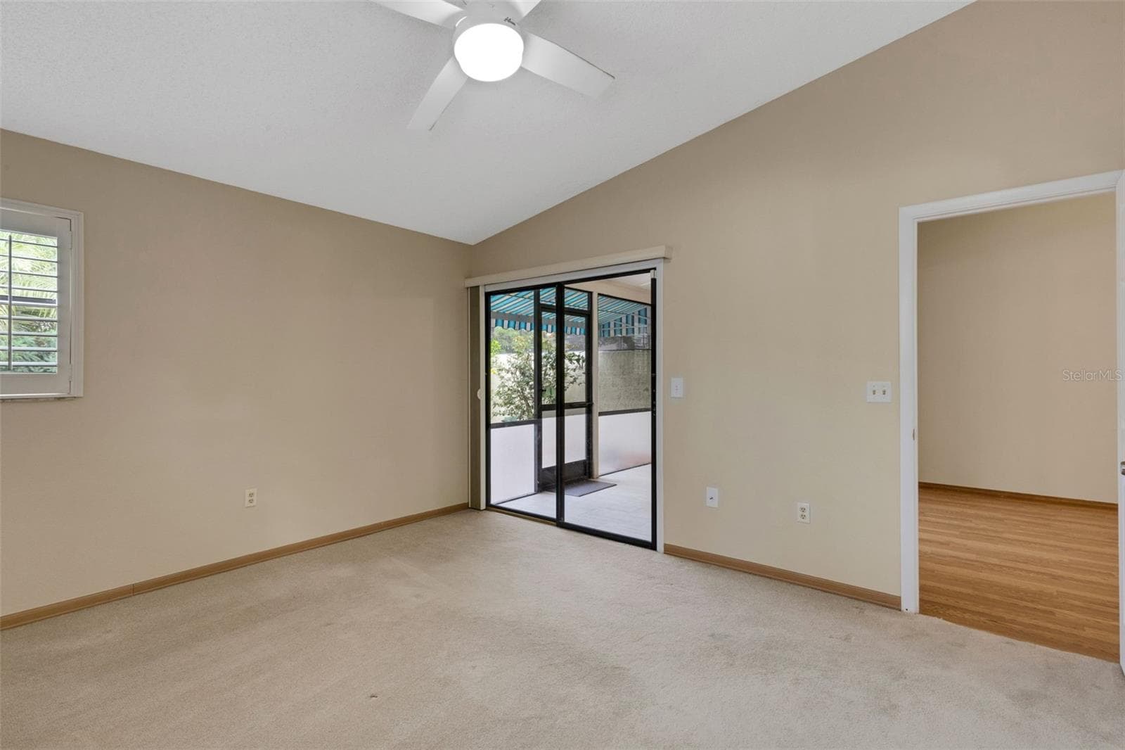 Primary Bedroom has Sliding Glass Doors to Lanai - 3441 BEEKMAN PL #40, SARASOTA