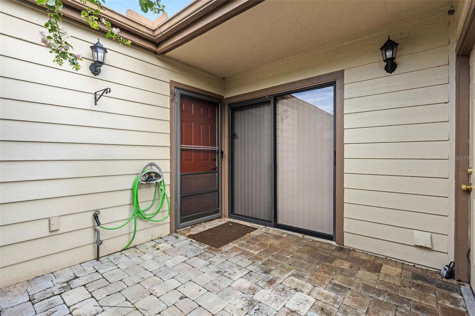 Front Door and Sliding Glass Doors to Kitchen - 3441 BEEKMAN PL #40, SARASOTA