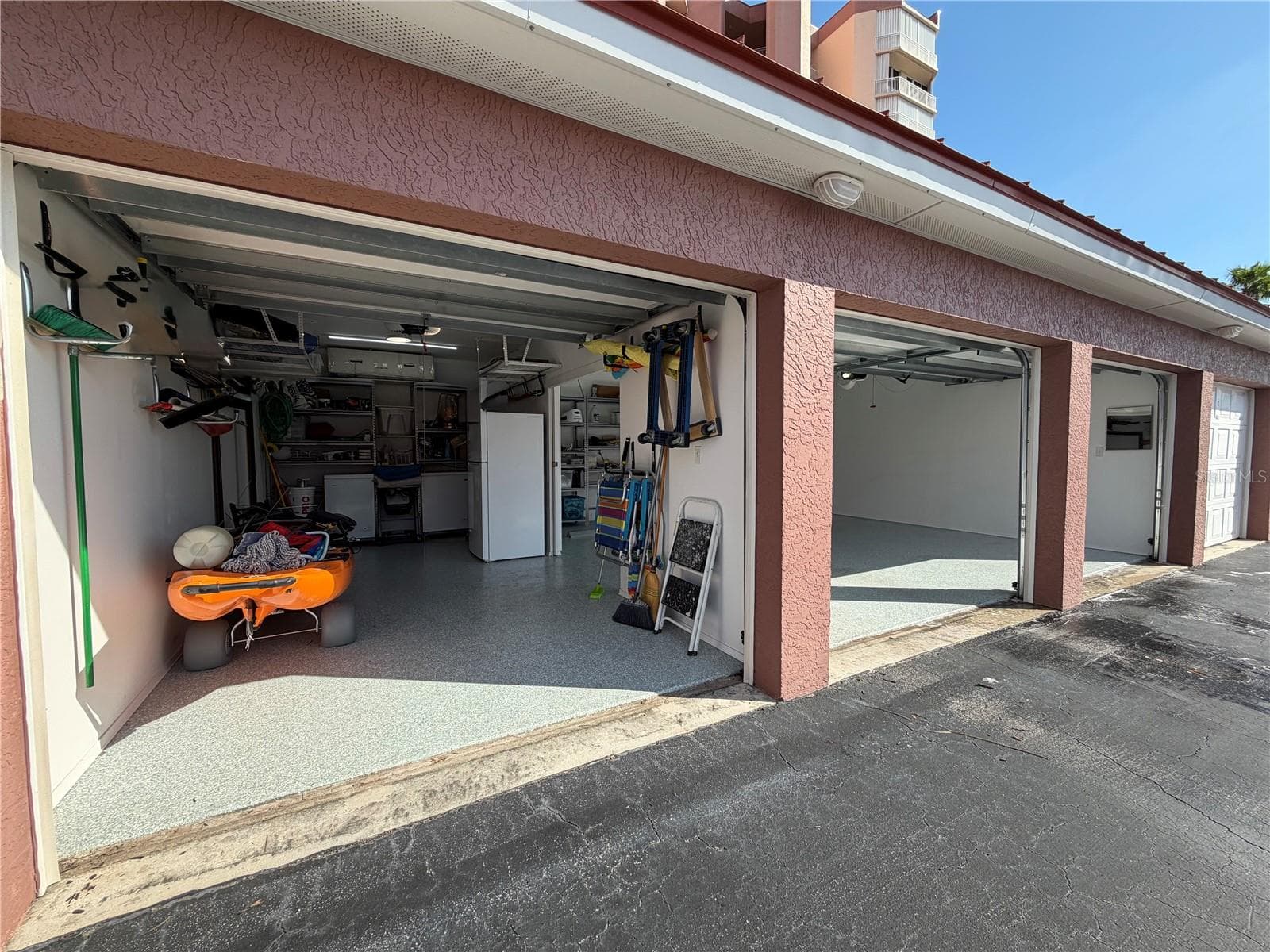 Pocket doors between first and second garage - 3880 N HIGHWAY A1A #104, HUTCHINSON ISLAND