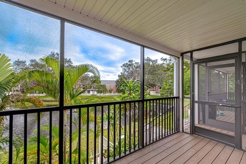 Savor a sip of coffee or wine on your private screened in balcony - 13693 ORANGE SUNSET DR #203, TAMPA