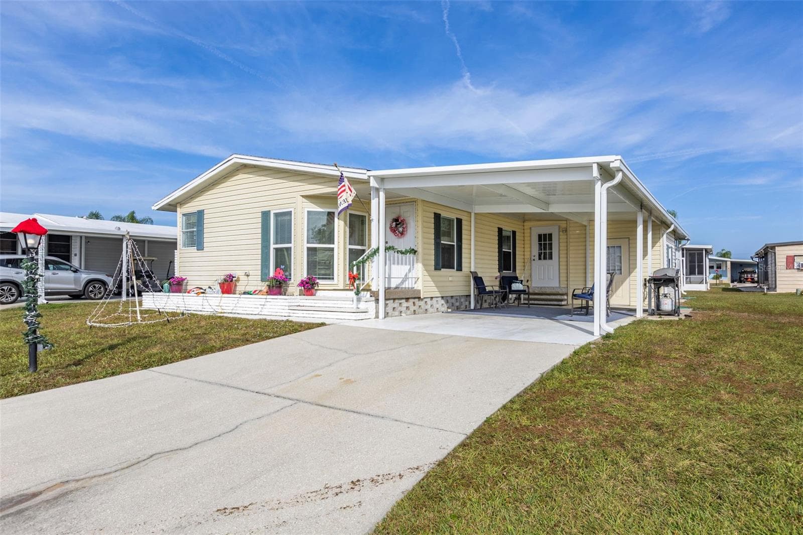 Manufactured Home at 512 LA PLAYA CIR, NORTH PORT, photo 2 of 77