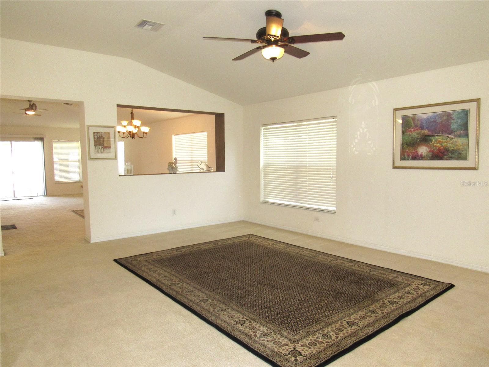 Living room with opening to family/dining room - 191 ALLWORTHY ST, PORT CHARLOTTE