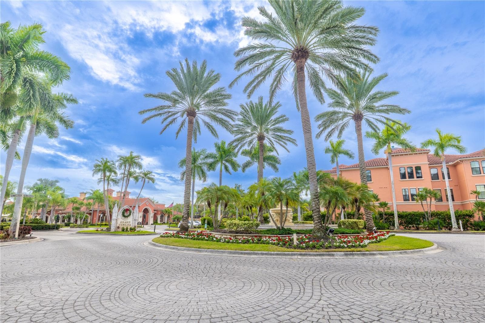 A coveted second-floor corner residence, bathed in natural light, sits gracefully within this palm-lined Mediterranean-style community. - 2738 VIA TIVOLI #220B, CLEARWATER