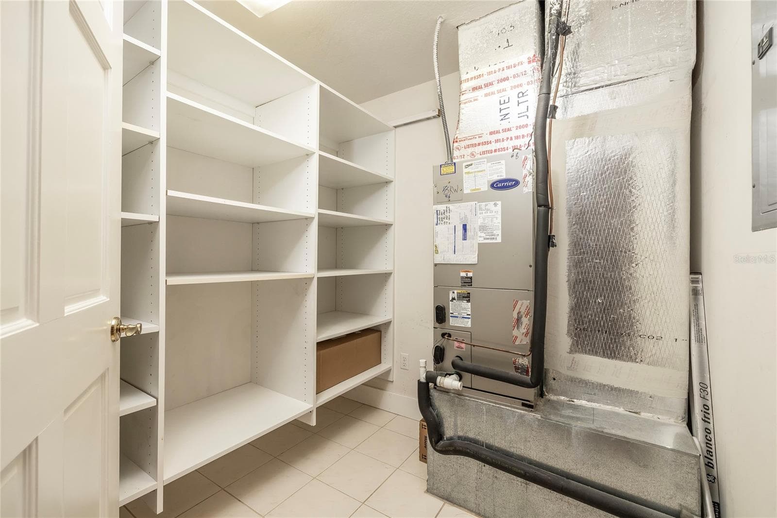 Separate storage closet inside the unit - 2 SEASIDE LN #103, BELLEAIR