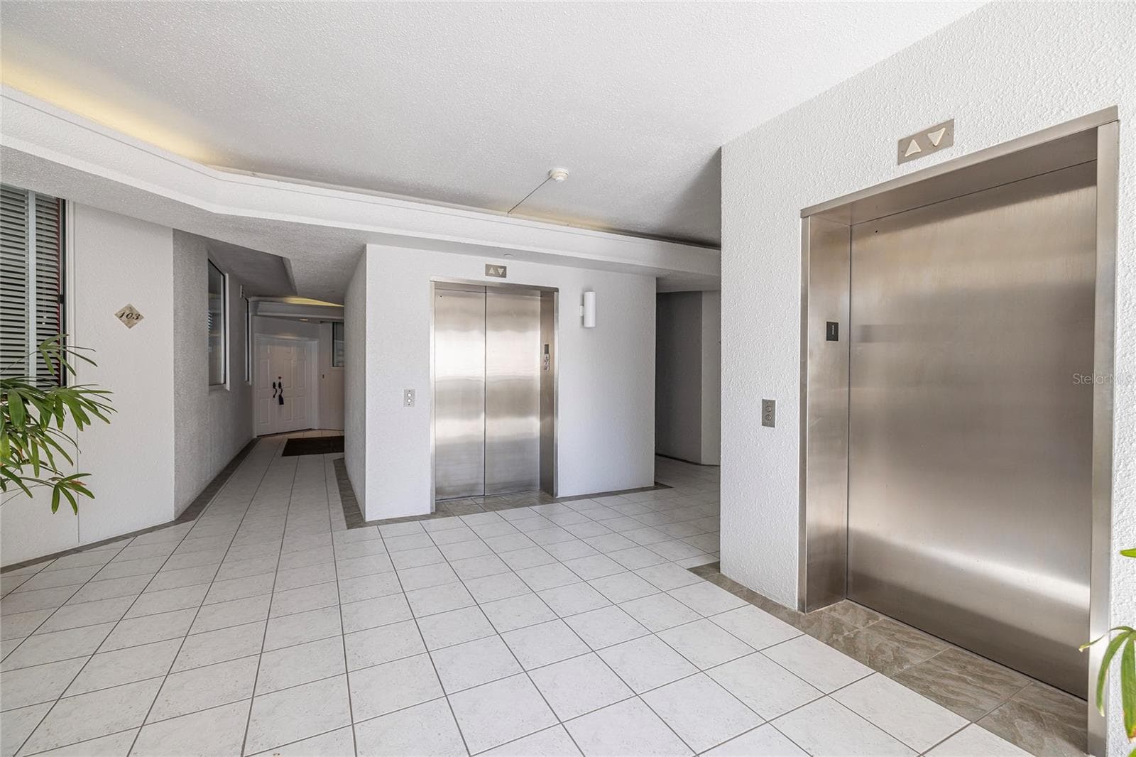 Elevators, unit 103 on left - 2 SEASIDE LN #103, BELLEAIR