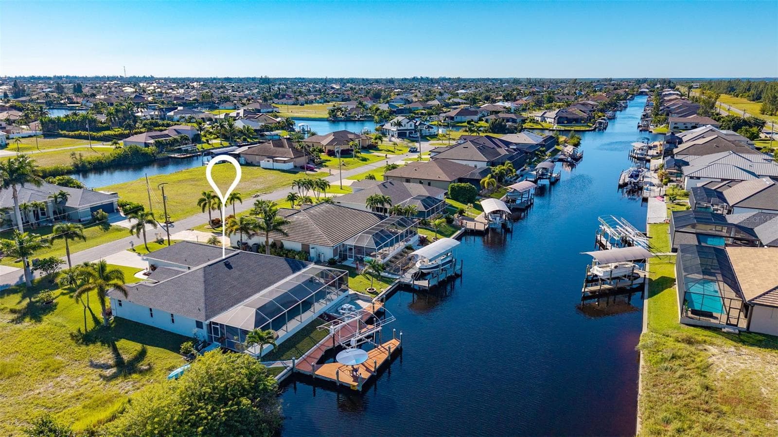 Canal view - 430 NW 39TH AVE, CAPE CORAL