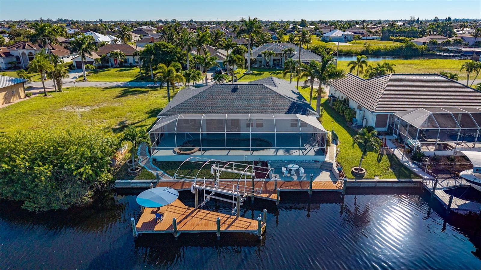 Canal view - 430 NW 39TH AVE, CAPE CORAL