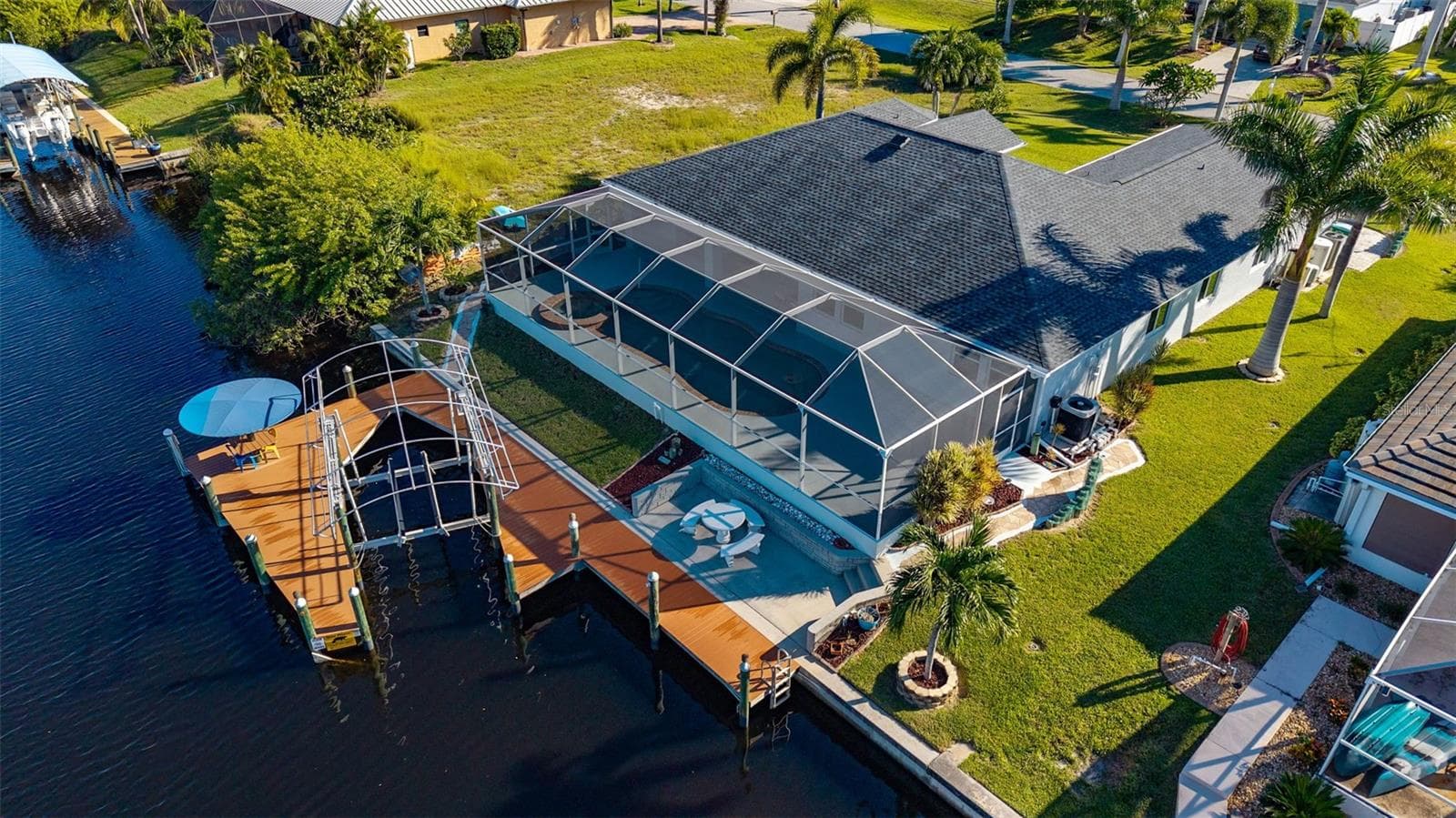 Canal view - 430 NW 39TH AVE, CAPE CORAL