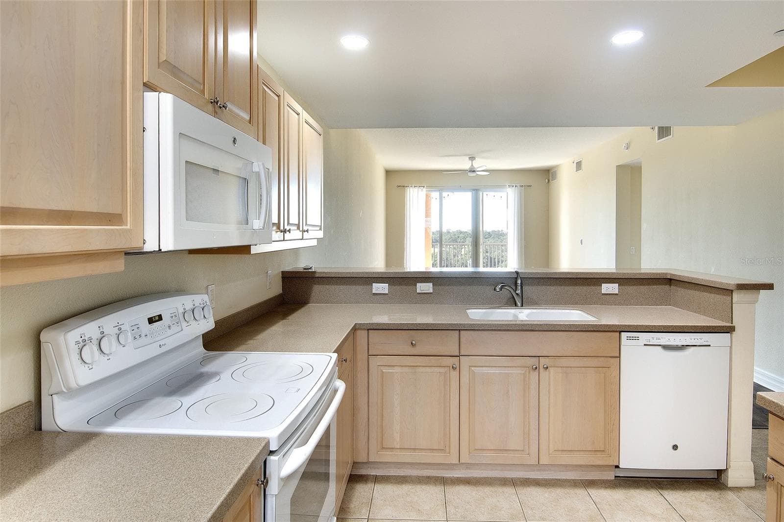Kitchen over looking the Living area - 1921 MONTE CARLO DR #603, SARASOTA
