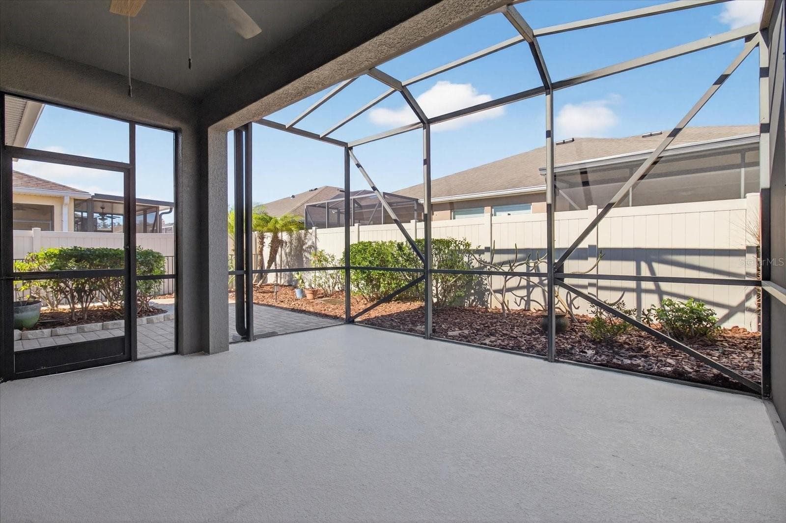 Spacious screened lanai offering covered outdoor living and entertaining space. - 2153 BARRACUDA CT, HOLIDAY