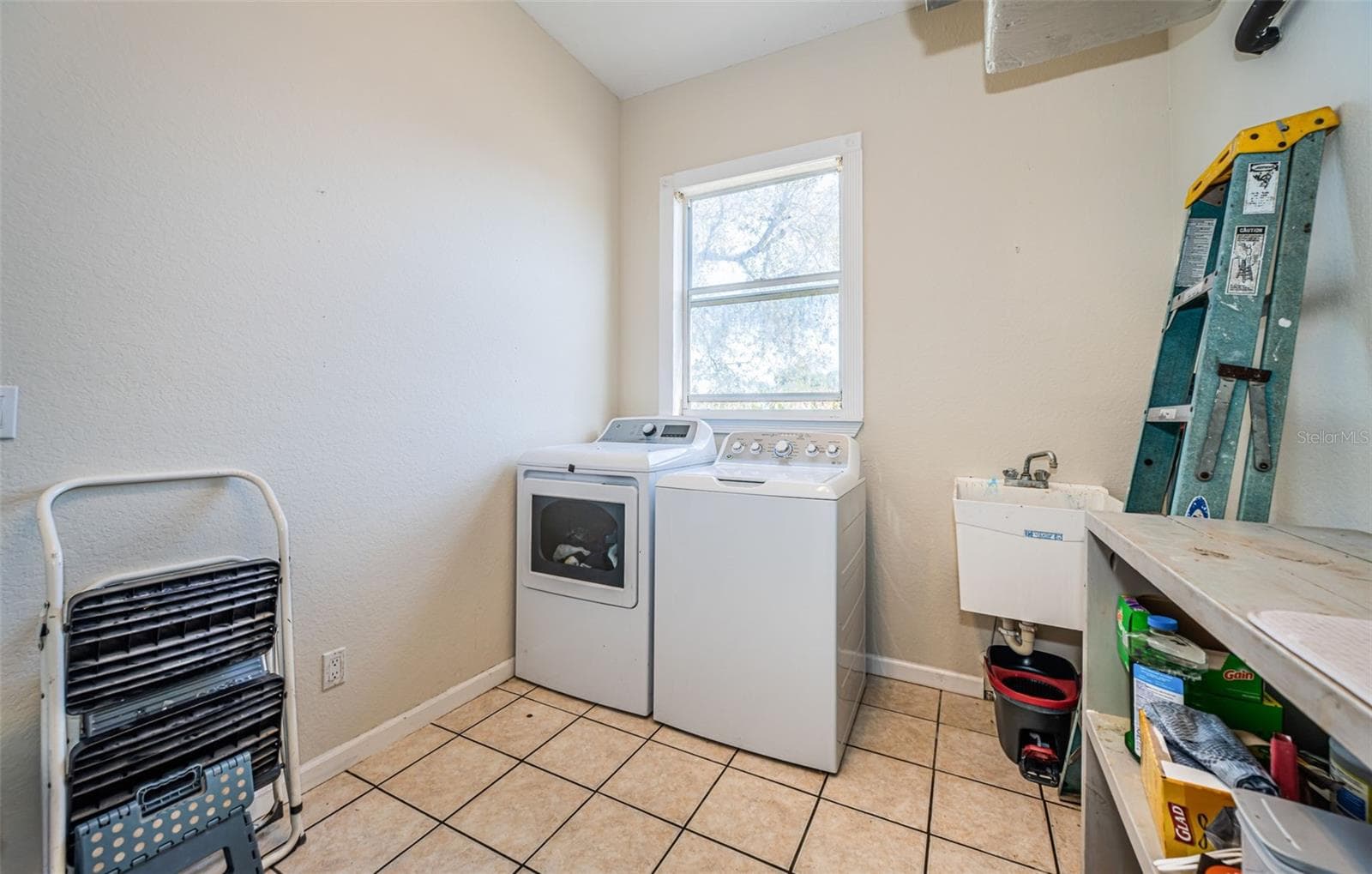 Inside Laundry Room. 5127 Bay Blvd Port Richey Waterfront Home - 5127 BAY BLVD, PORT RICHEY