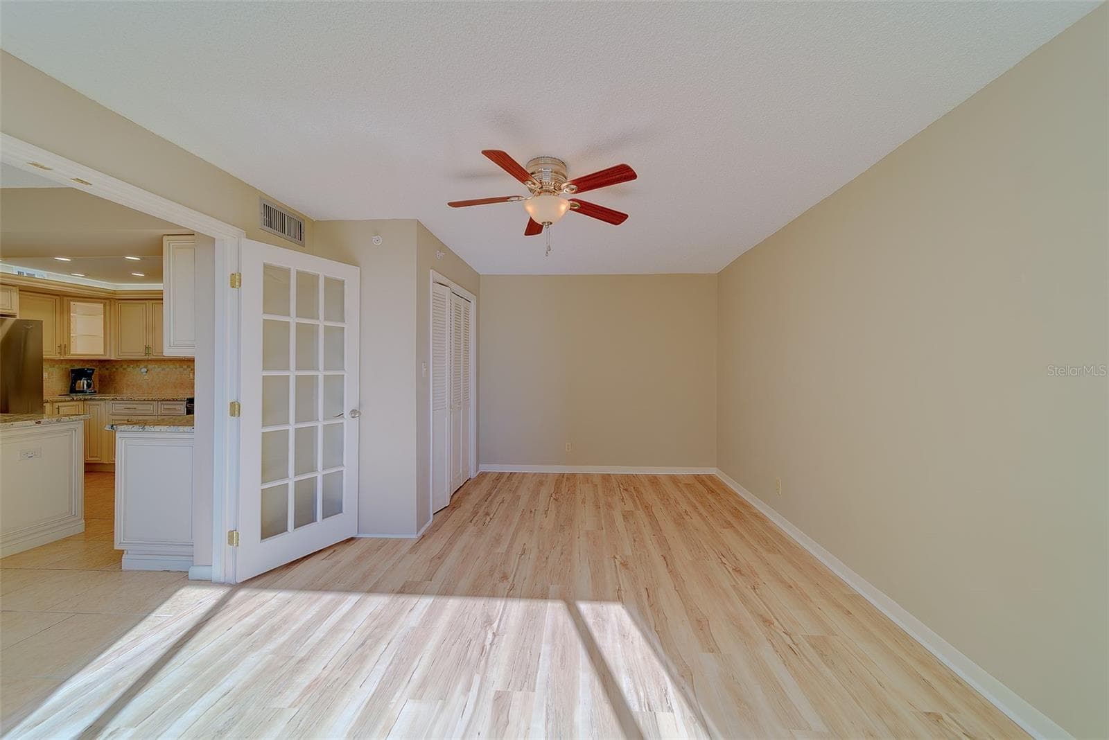 French door in bedroom 3 leading to kitchen - 1480 GULF BLVD #201, CLEARWATER BEACH