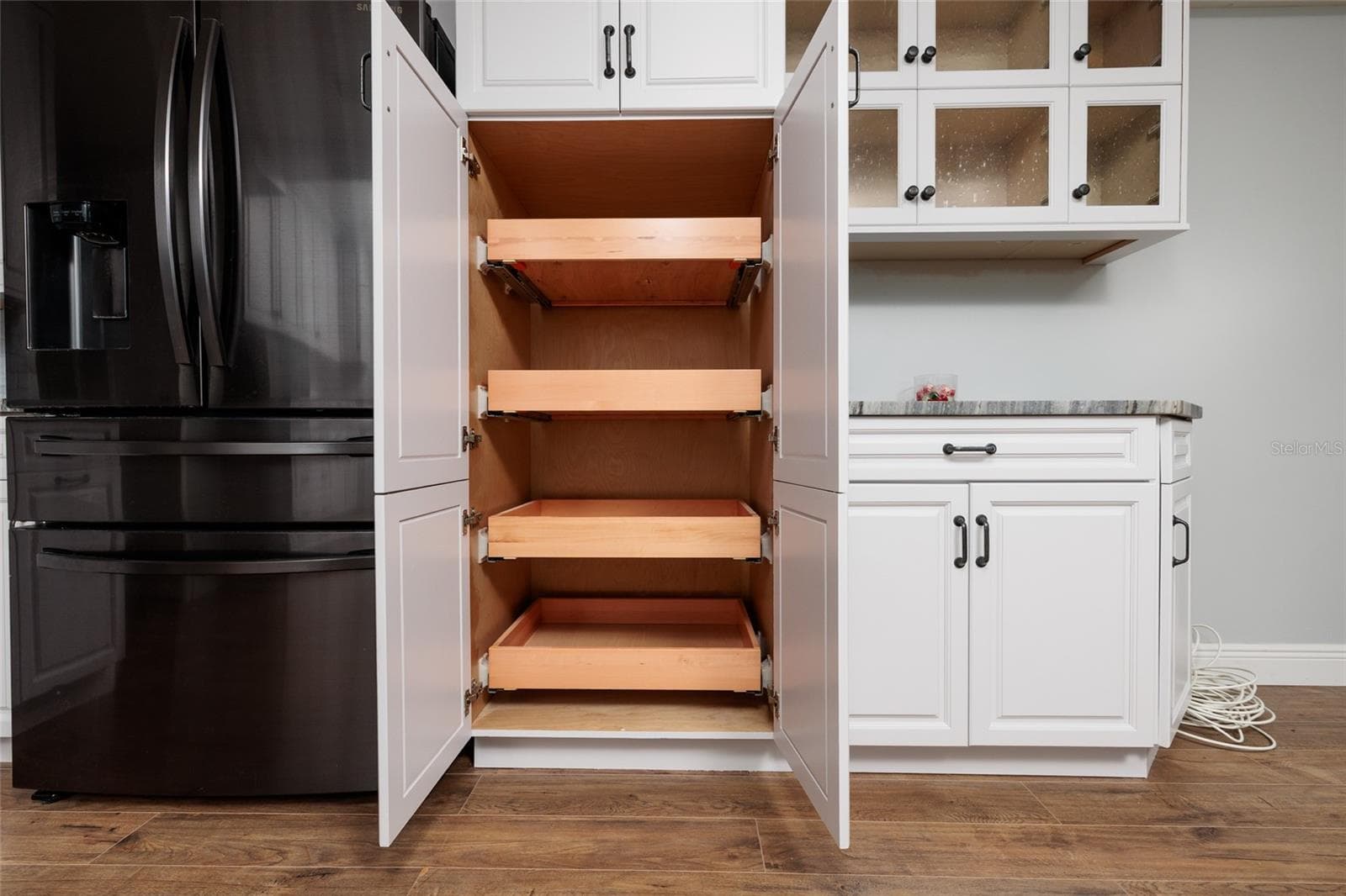 Kitchen Pantry w/Pull out shelves. - 6000 2ND ST E #6, ST PETE BEACH