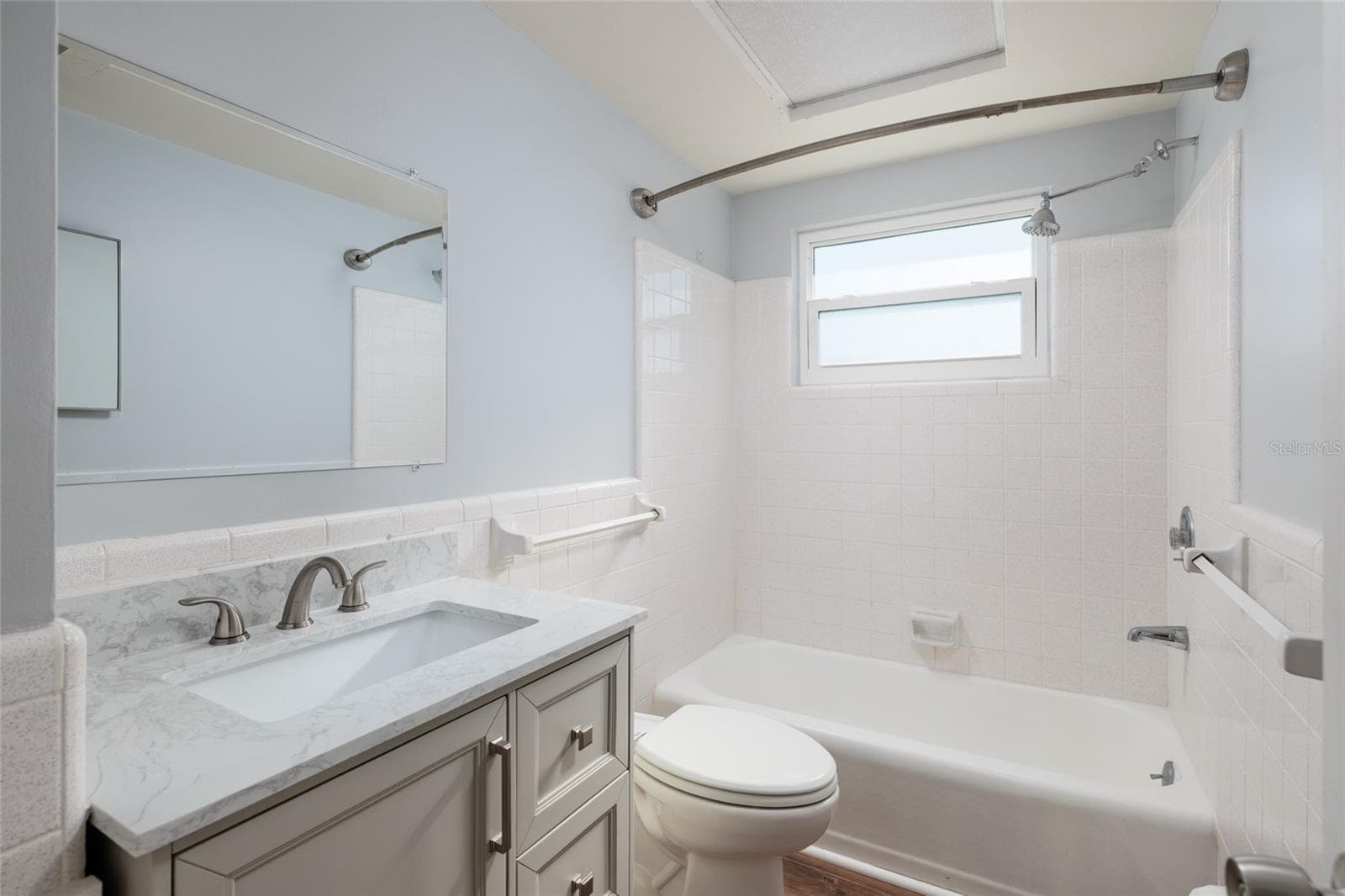 2nd bathroom. Granite counter. Hurricane impact double pane window. - 6000 2ND ST E #6, ST PETE BEACH