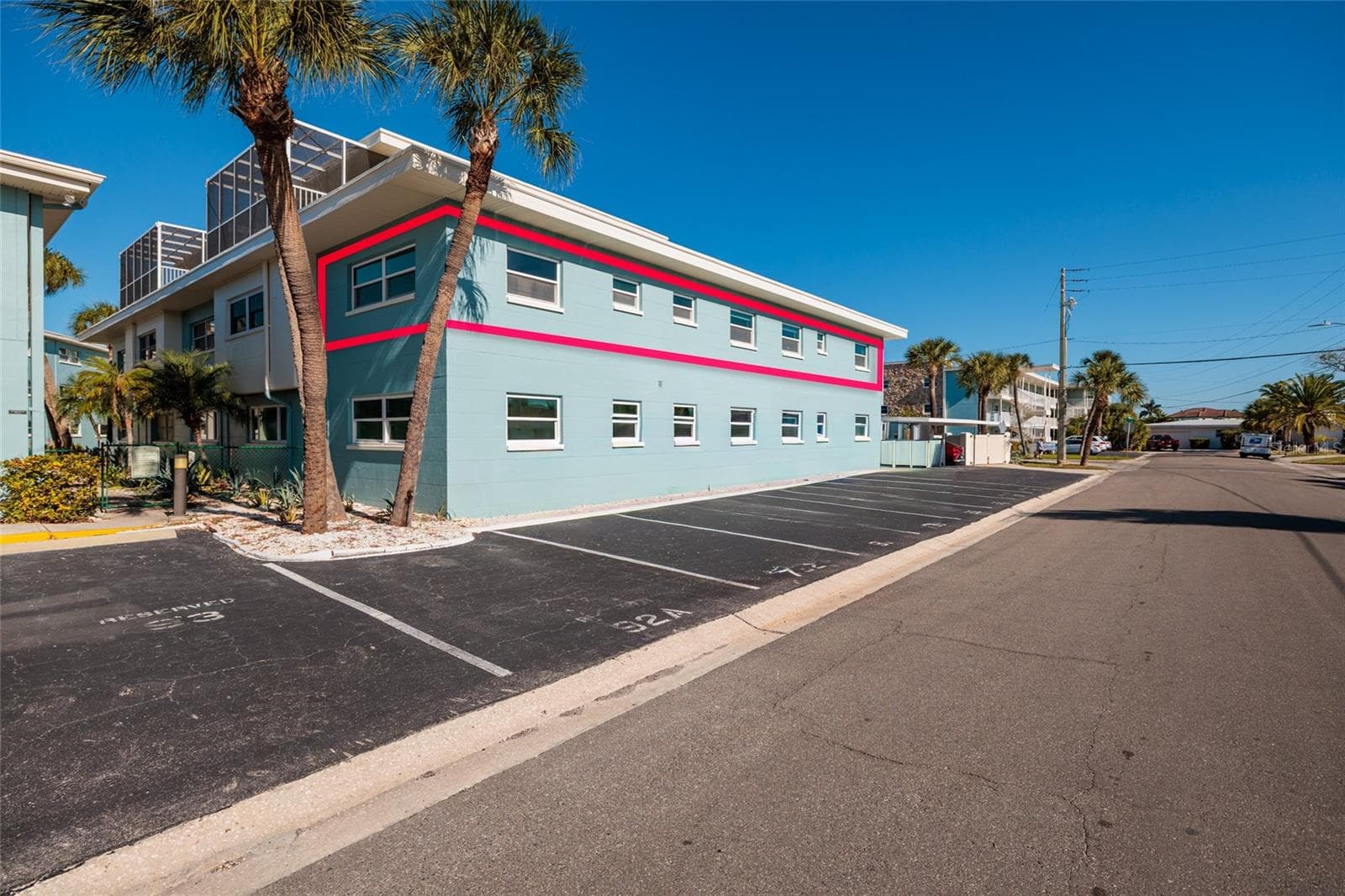 Corner top floor unit w/Hurricane impact double pane windows. There is additional guest parking on this side of bldg. - 6000 2ND ST E #6, ST PETE BEACH