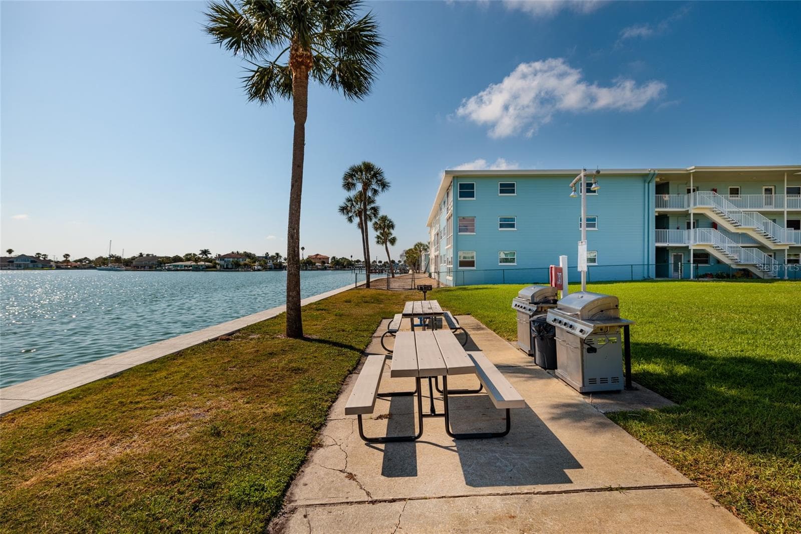 Grilling area #2 in North pool courtyard - 6000 2ND ST E #6, ST PETE BEACH