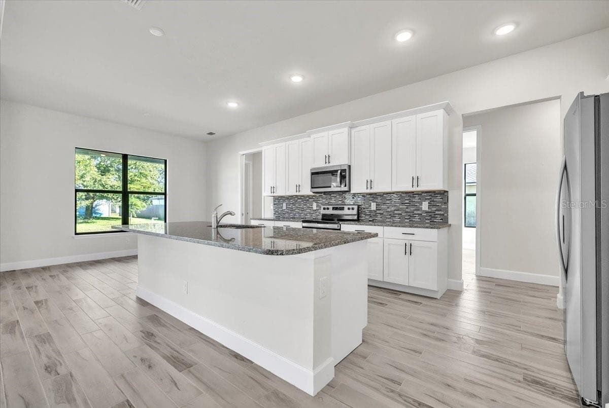 Single Family Residence at 459 NE 2ND PL, CAPE CORAL, photo 11 of 39