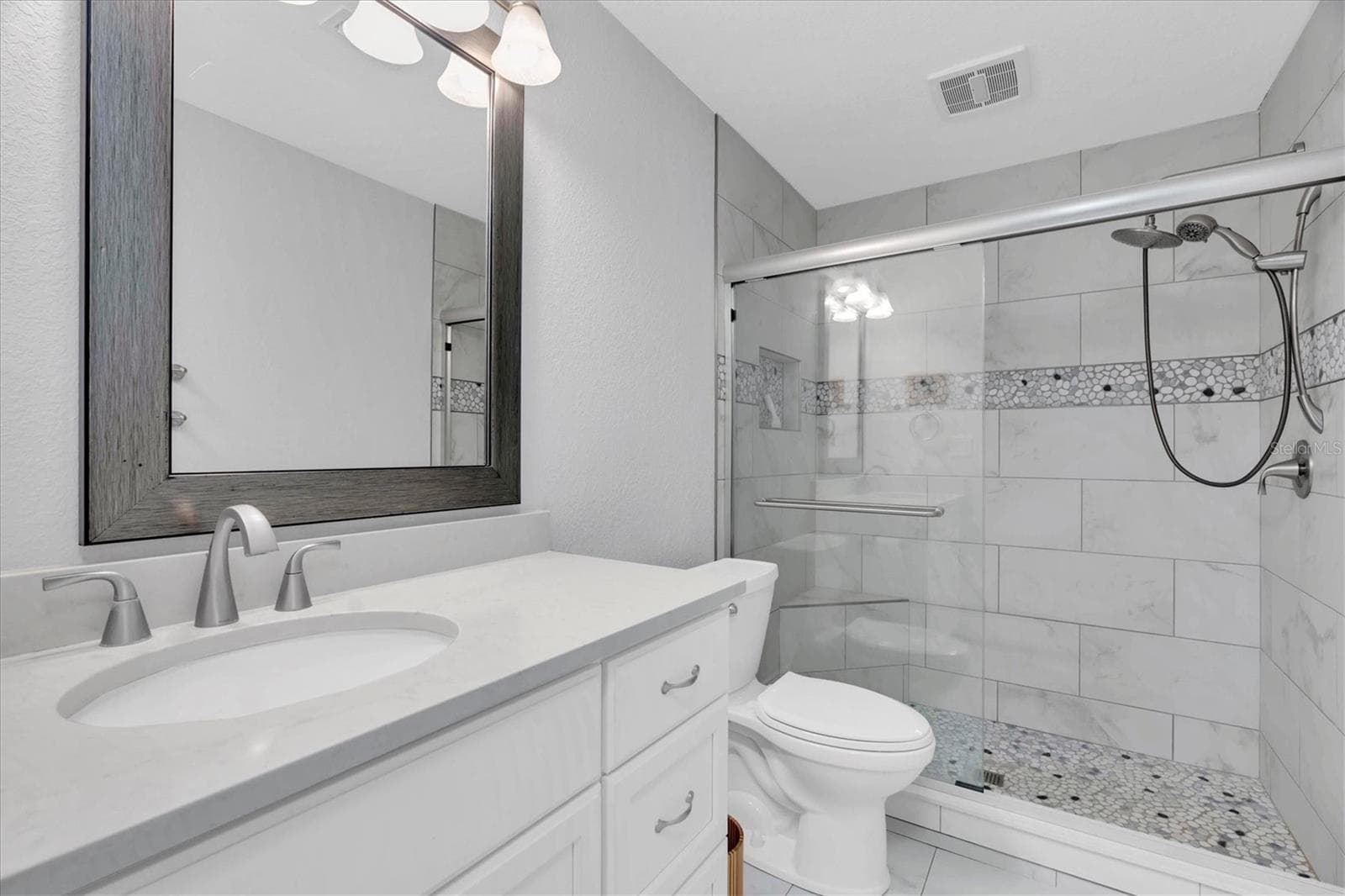 Downstairs hall full bath - 4935 62ND AVE S, ST PETERSBURG