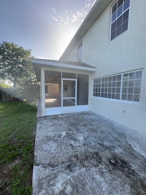 REAR PATIO & SCREENED PORCH - 386 HAVERSHAM RD, DELTONA