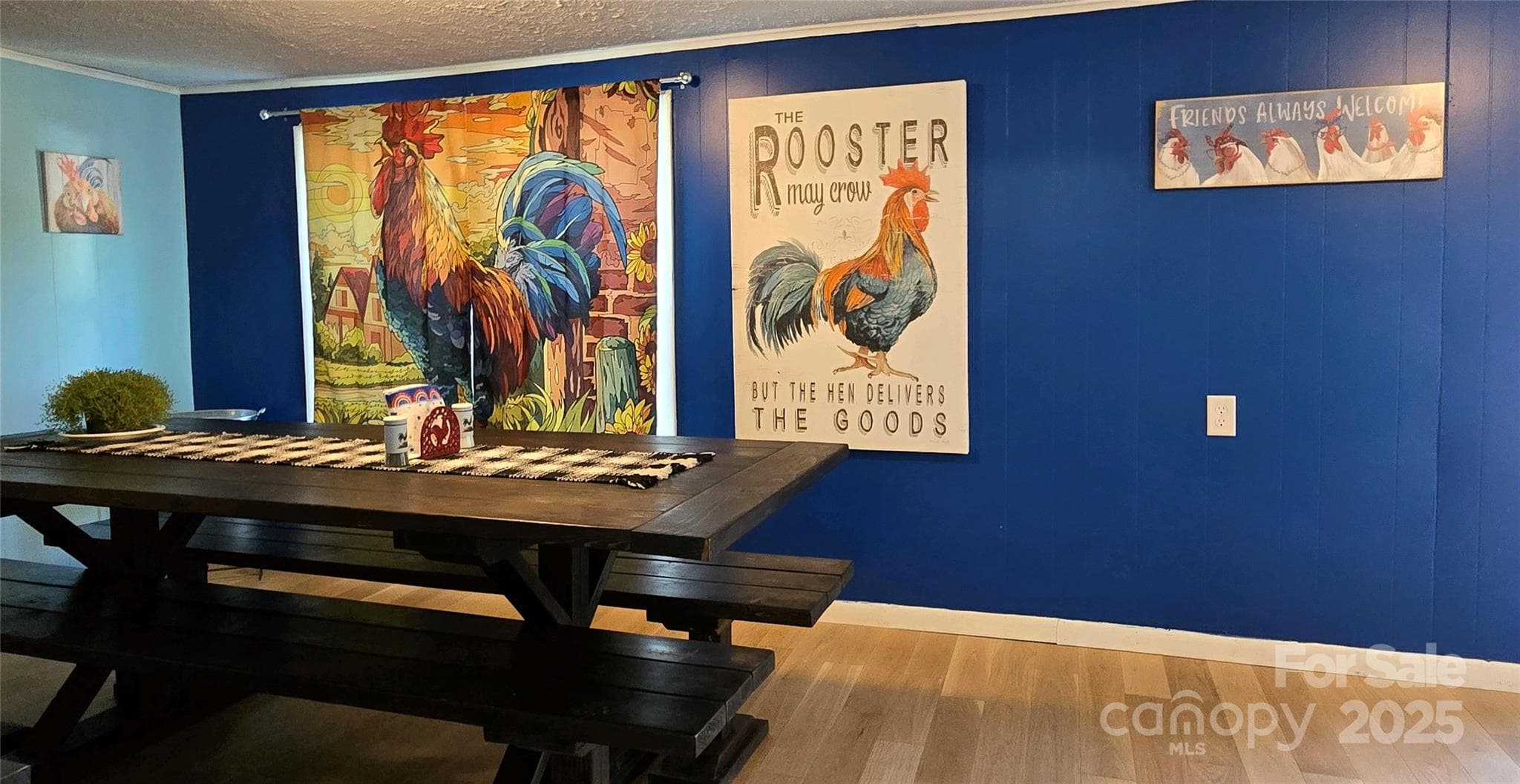 The dining room is the home of the roosters, and a few hens! - 626 Fairview Loop, Hot Springs