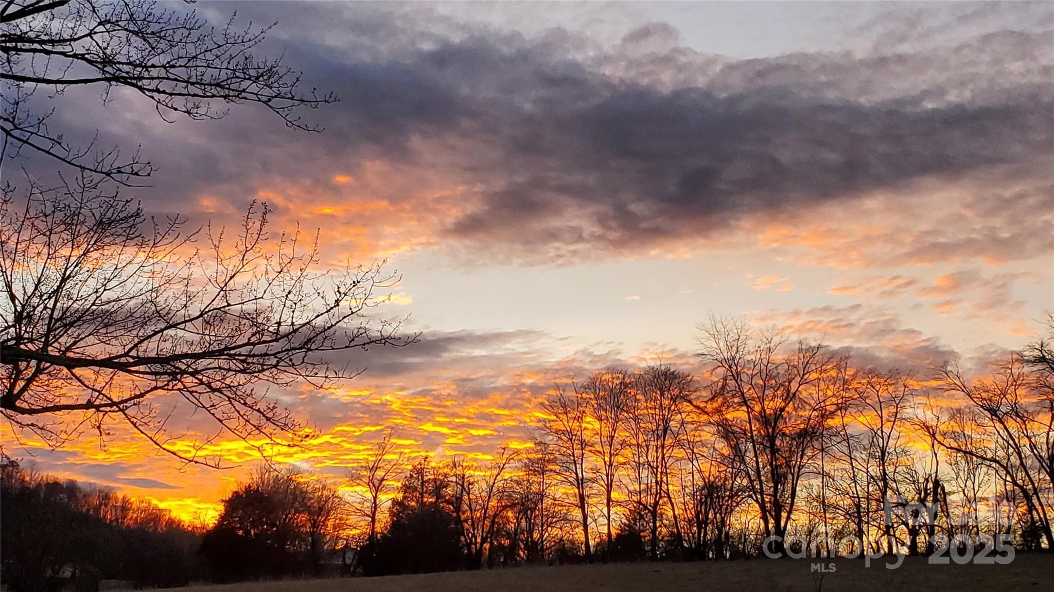 Sunsets are also incredible to the west of the house, from both the front porch and the rear deck / hot tub! - 626 Fairview Loop, Hot Springs