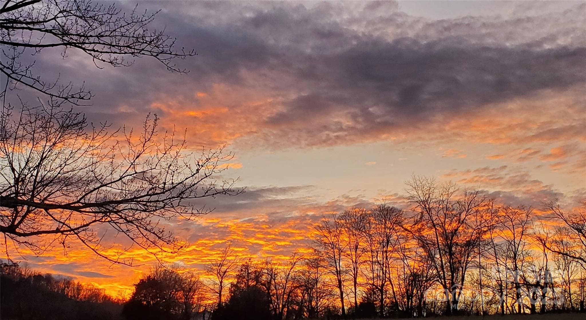 Sunsets are also incredible to the west of the house, from both the front porch and the rear deck / hot tub! - 626 Fairview Loop, Hot Springs