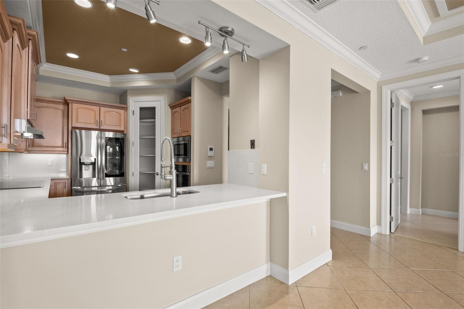 Looking into Kitchen from Dining Room area. - 8 ACADEMY WAY S #123, ST PETERSBURG
