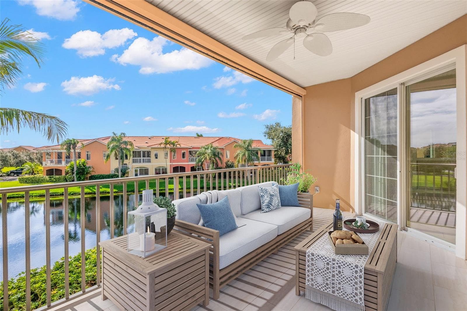 Virtually staged; partial view of large, Covered Terrace (19'x10') - 8 ACADEMY WAY S #123, ST PETERSBURG