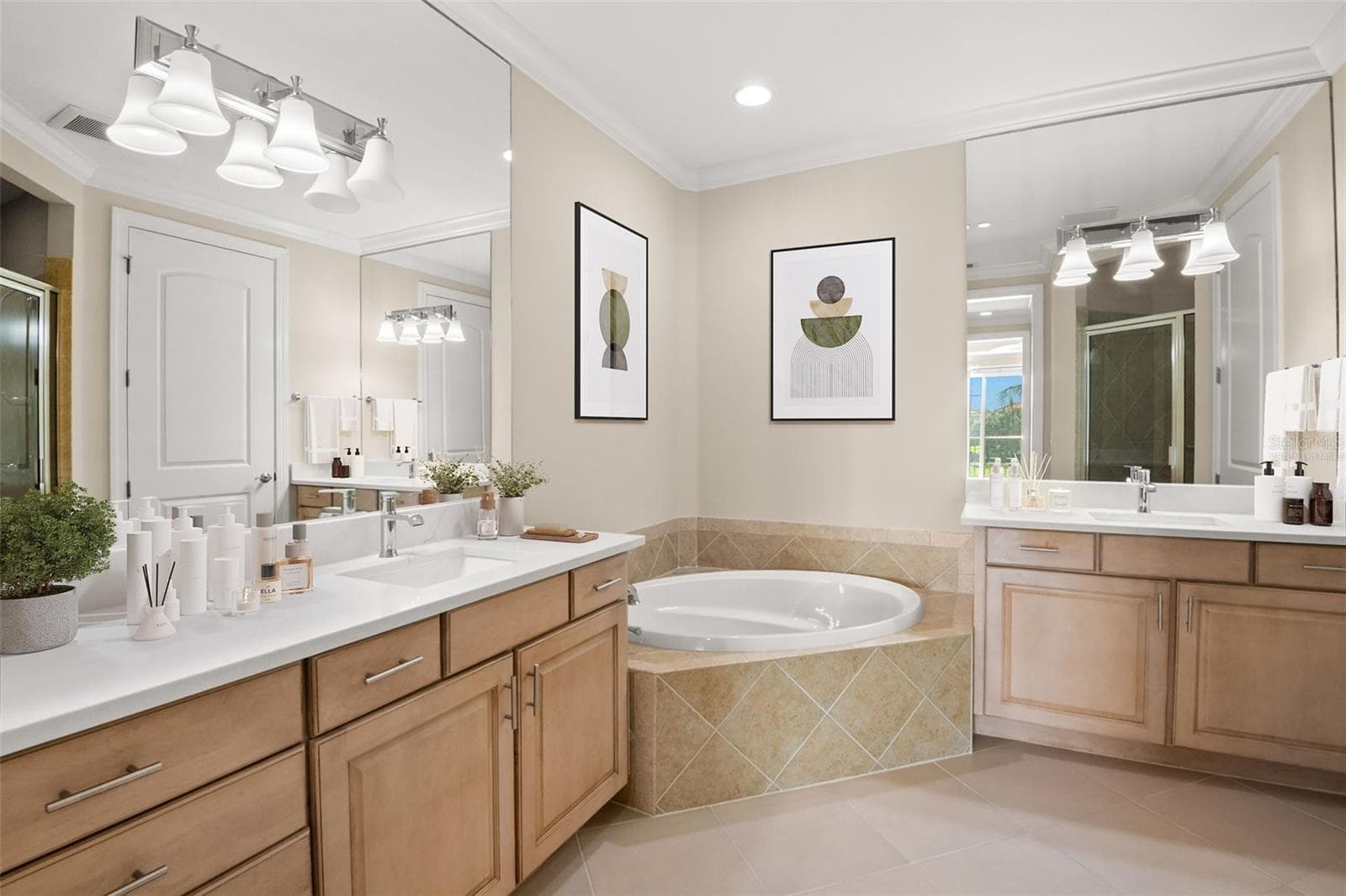 Virtually staged; Oversized, dual vanities, and large tub in Owner's Bath. - 8 ACADEMY WAY S #123, ST PETERSBURG