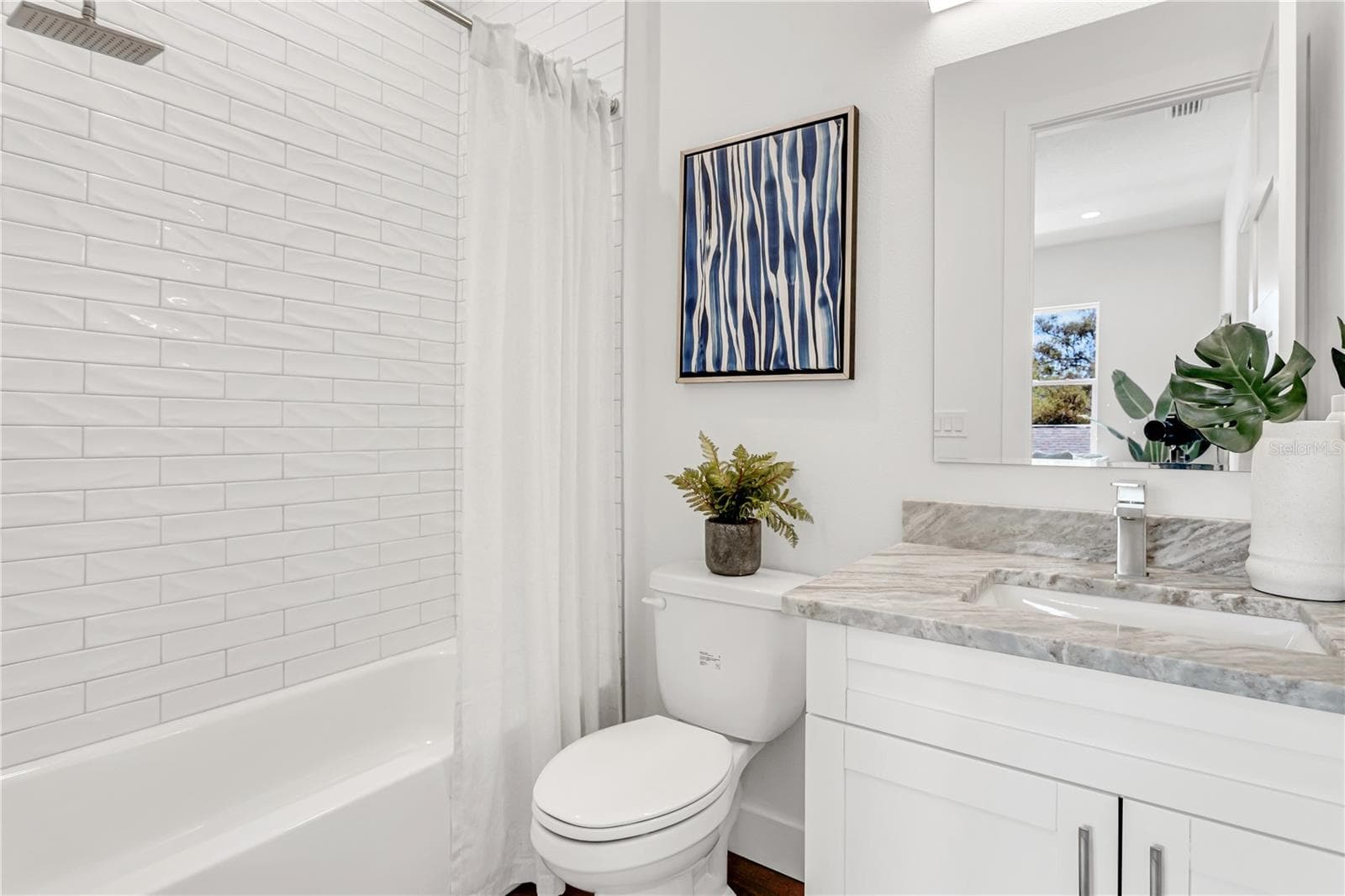 Photo from decorated model home, Bath 2 - 5530 N 9TH ST #3, TAMPA