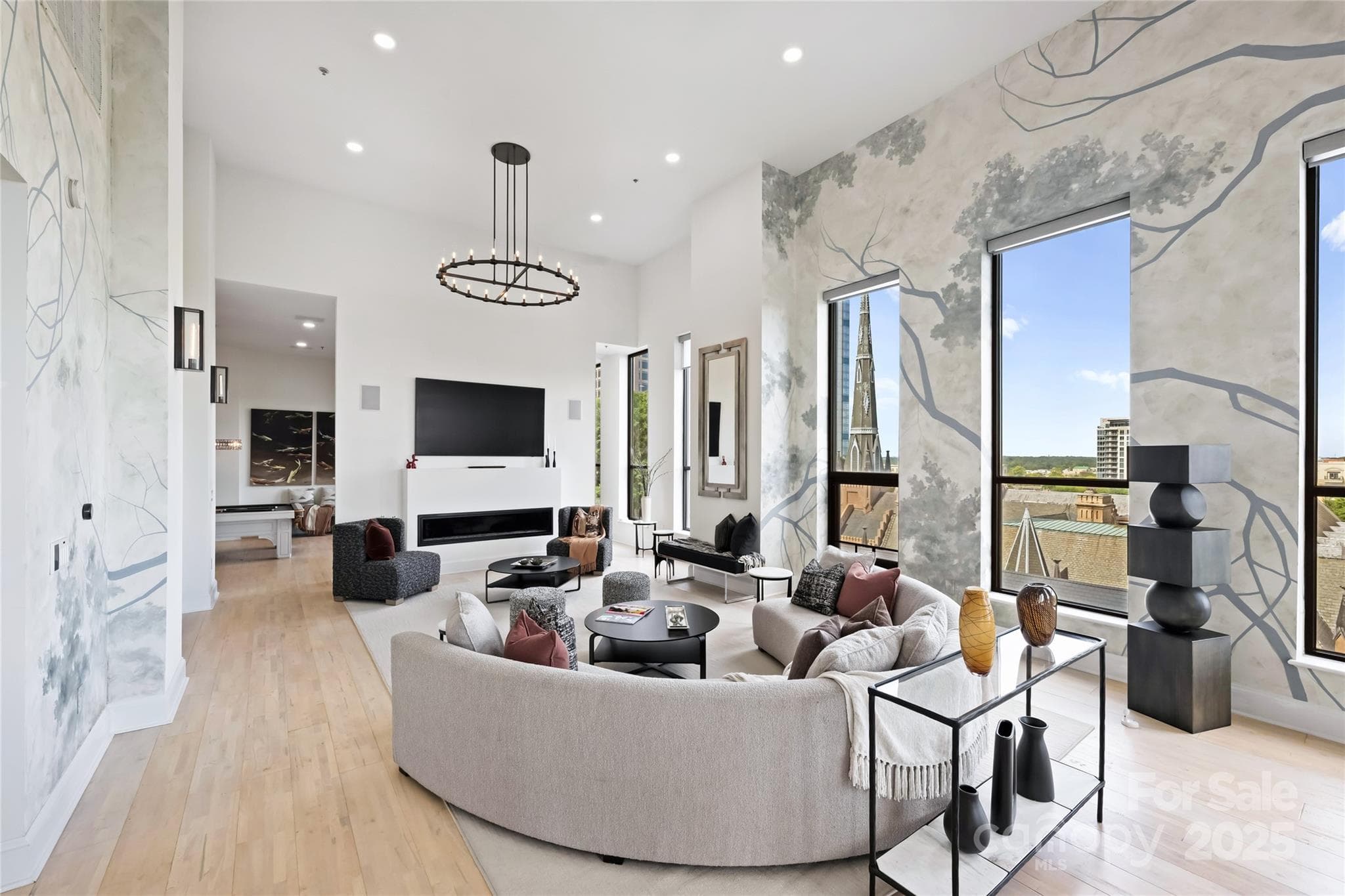 Great room alternate angle highlighting dramatic scale and architectural volume - Charlotte