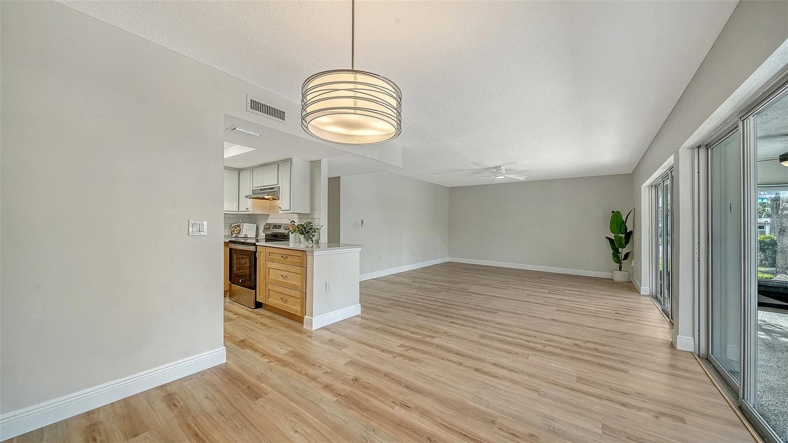 Kitchen to the left. - 101 WHISPERING SANDS DR #107, SARASOTA