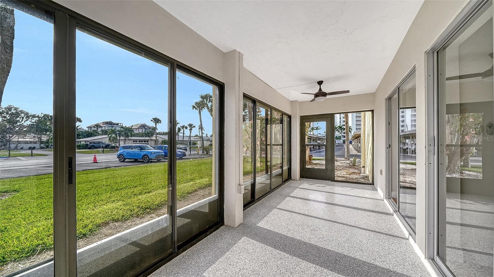 Lanai #2, also with epoxy flooring and new ceiling fans. - 101 WHISPERING SANDS DR #107, SARASOTA
