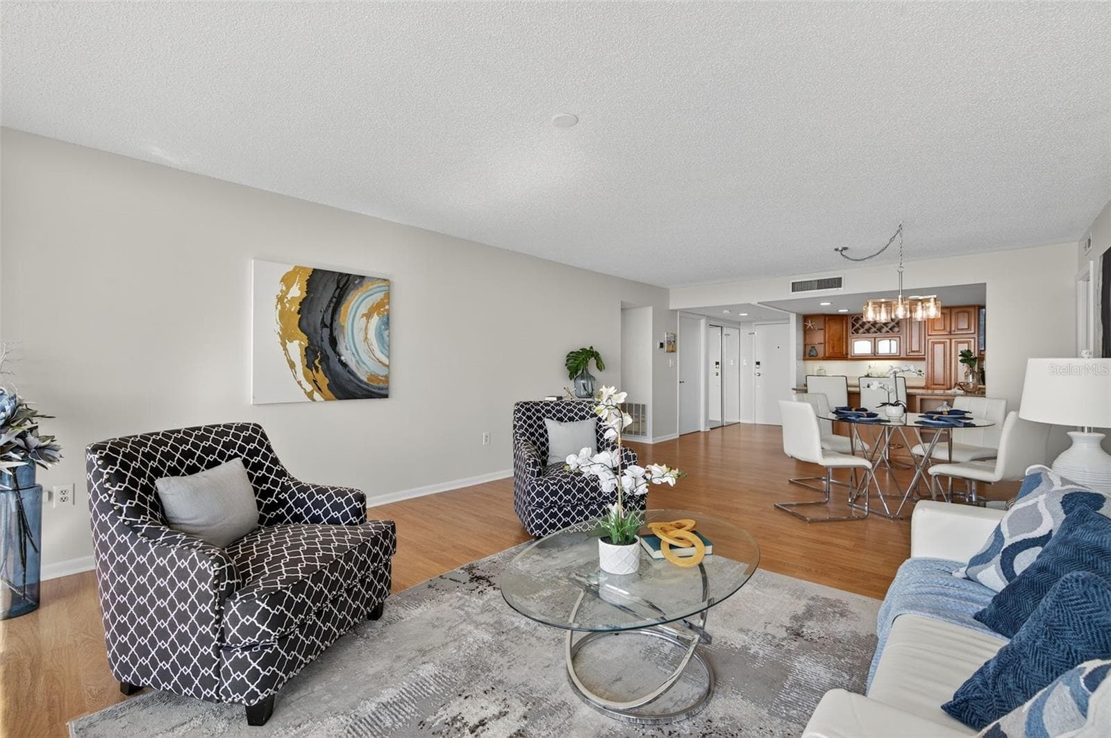 Living room and dining area - 7600 BAYSHORE DR #902, TREASURE ISLAND