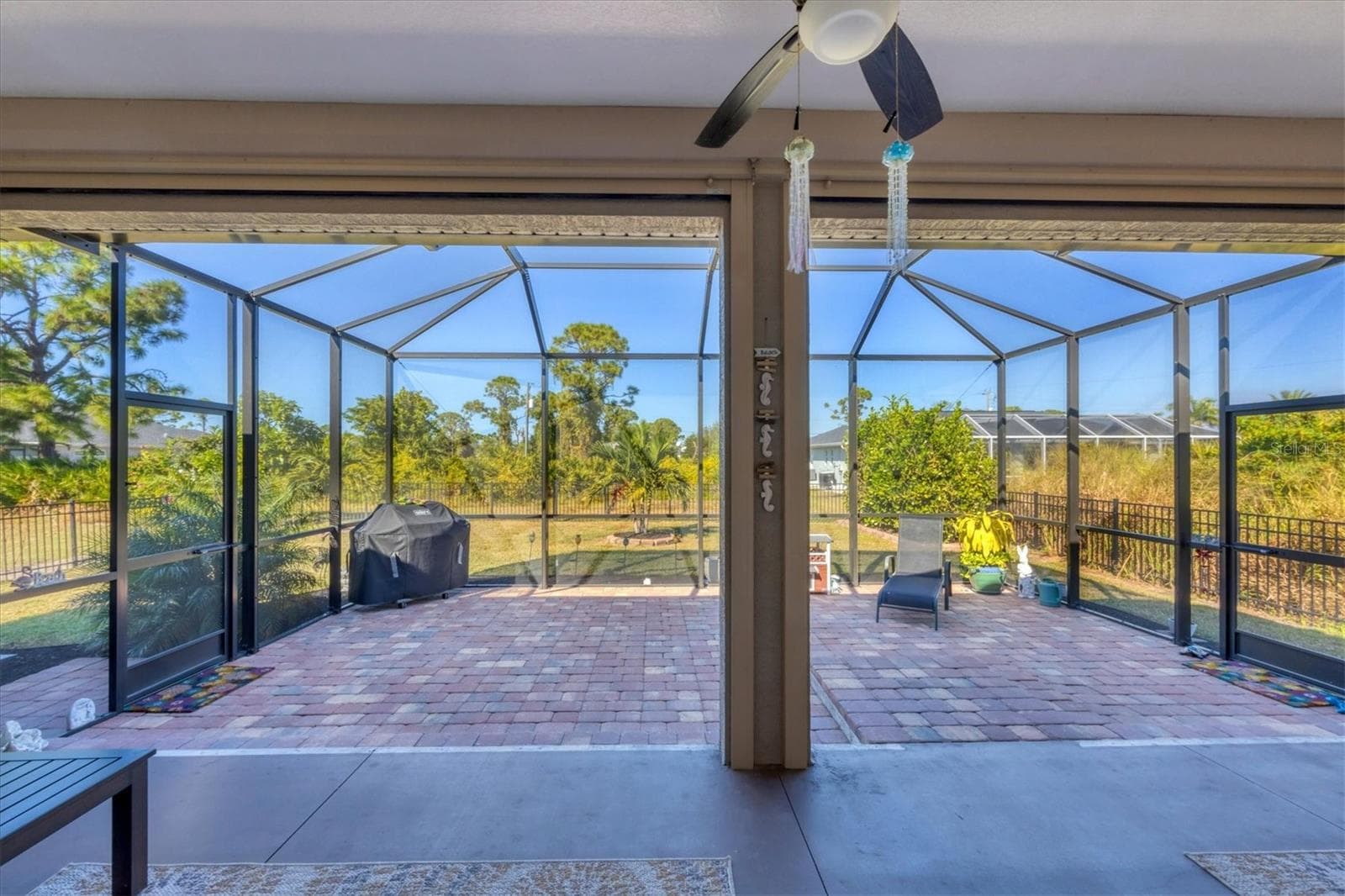 Enjoy your extended screen patio! - 112 BERYL DR, ROTONDA WEST