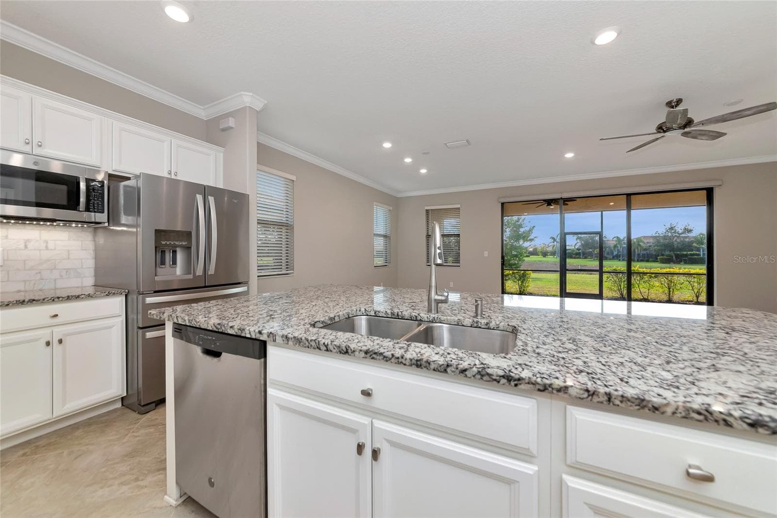 cabinet height island - 10202 MARBELLA DR, BRADENTON