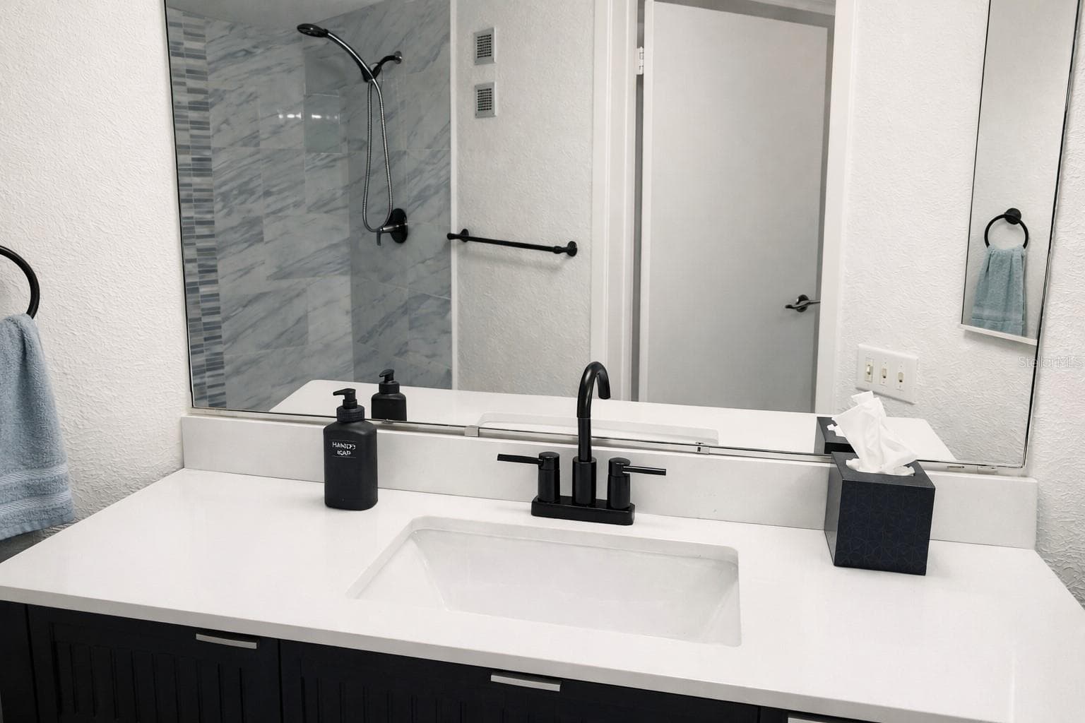 New Vanity, toilet, cabinetry, flooring - 2333 FEATHER SOUND DR #B304, CLEARWATER