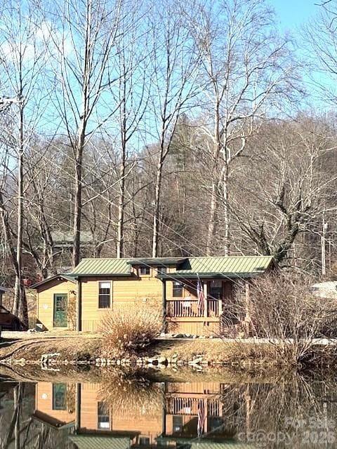 home as seen from across the lake - Waynesville
