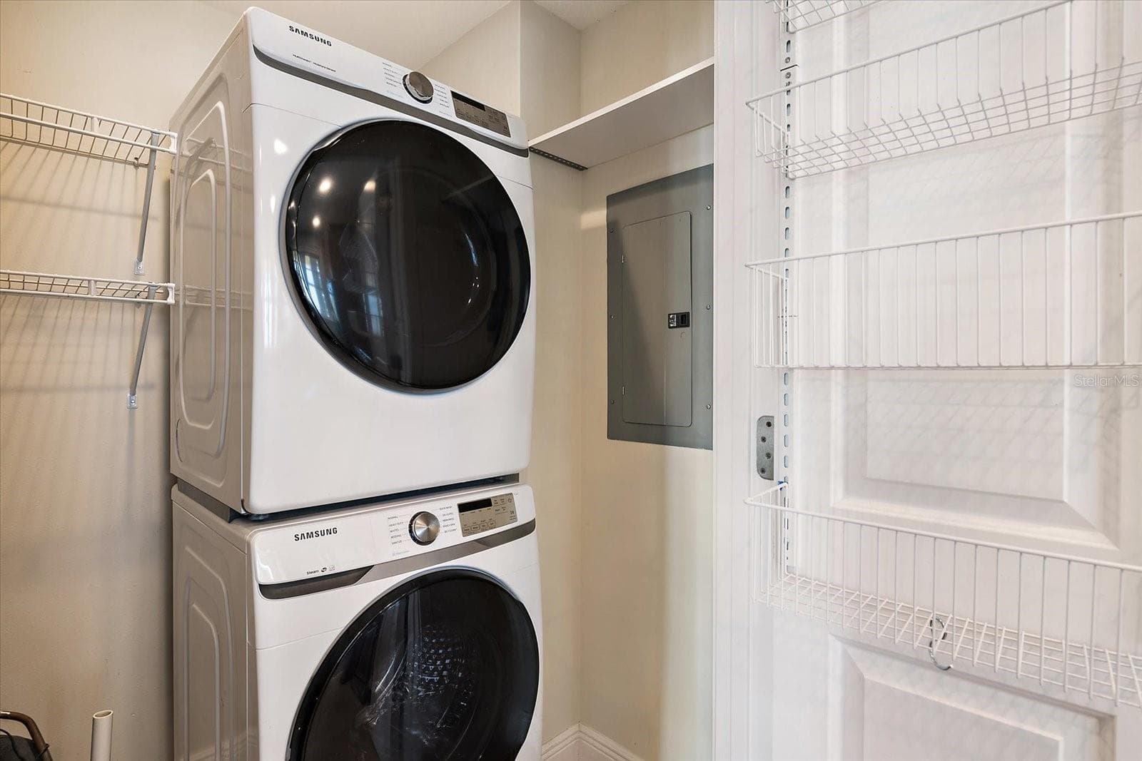 In-unit laundry with stacked washer and dryer - 445 N ORANGE AVE #210, SARASOTA