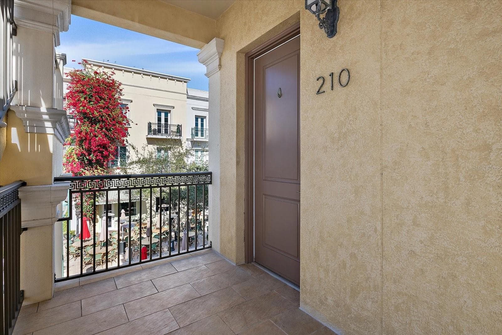 Exterior corridor leading to residence - 445 N ORANGE AVE #210, SARASOTA