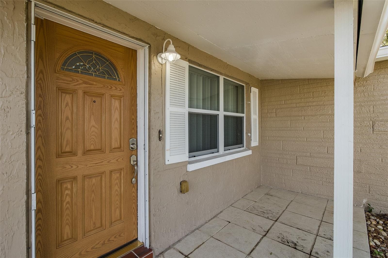 Front Door Covered Porch - 1148 FERNWOOD DR, HOLIDAY