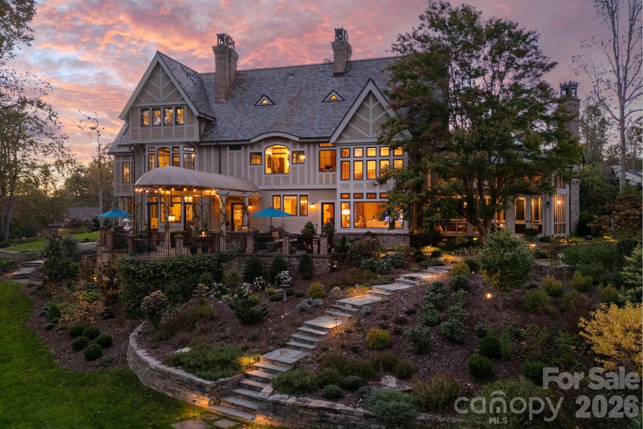 Gracefully sited above the golf course. Wonderful patio to relax and watch the golfers play. - Asheville