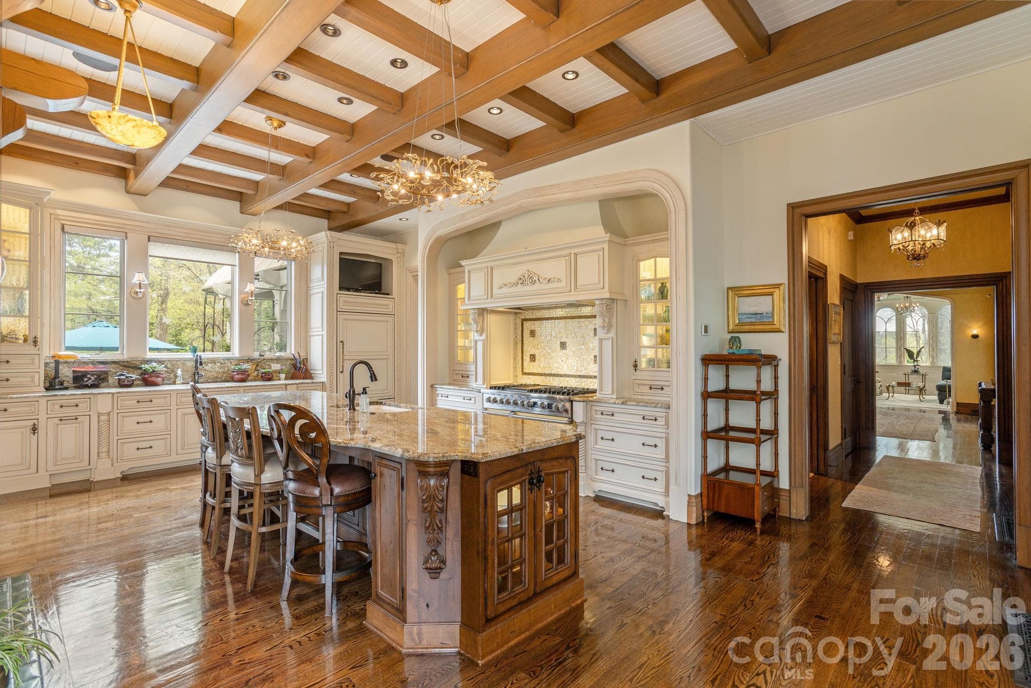 French country inspired chef's kitchen with custom cabinetry and premium appliances - 8 Fairway Place, Asheville