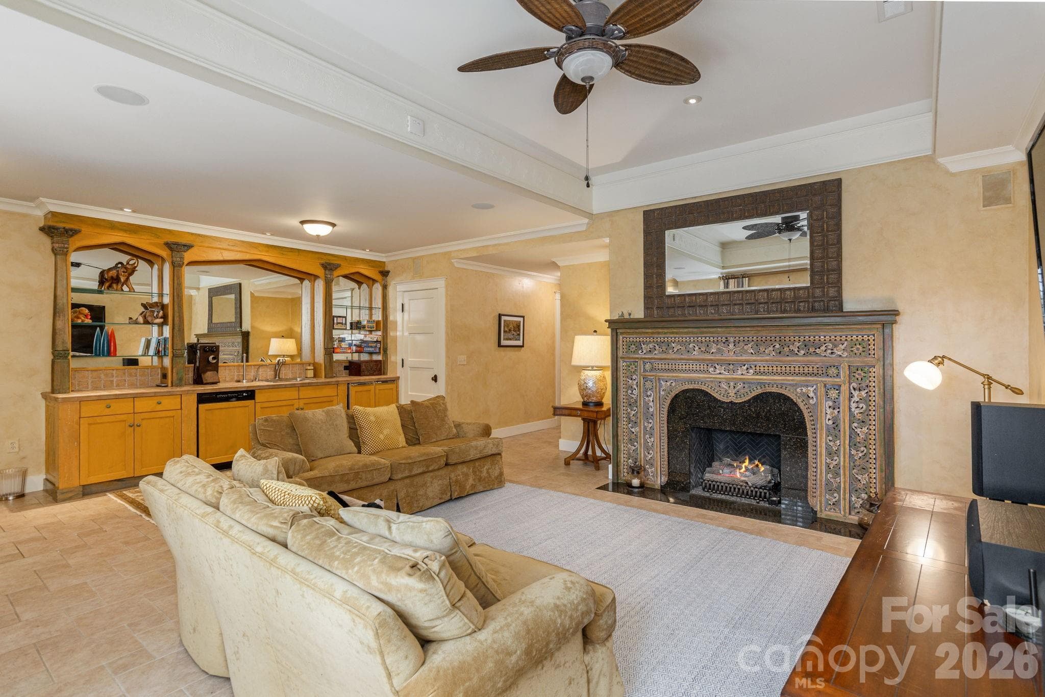 Spacious lower-level recreation room with fireplace - 8 Fairway Place, Asheville